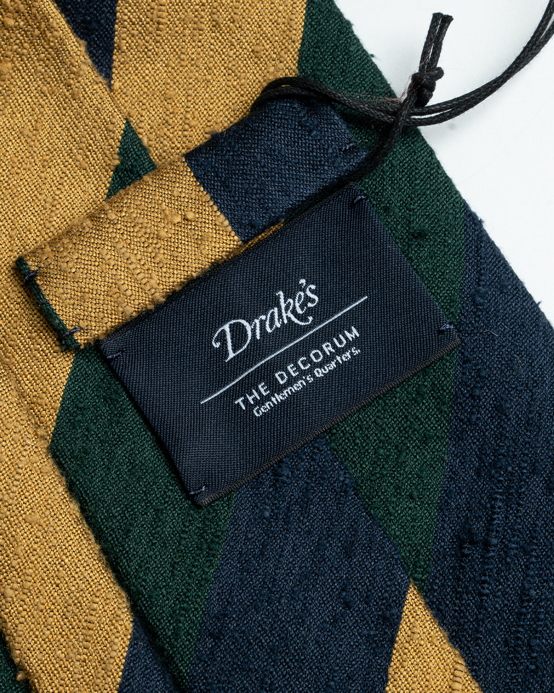Drake’s archival tie collection for The Decorum - Yellow/Green stripe