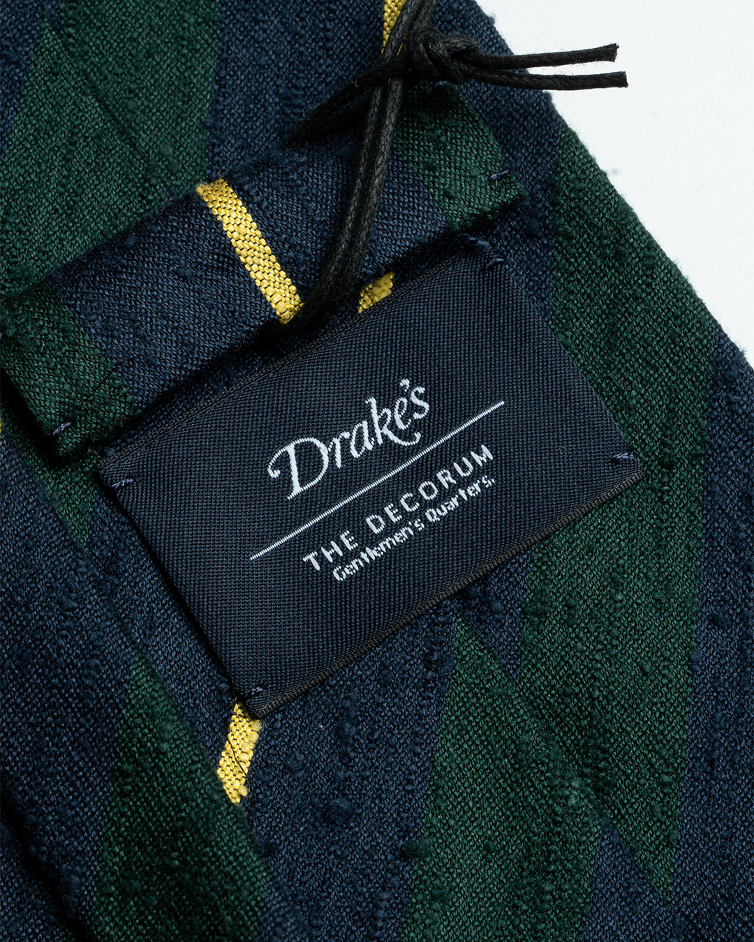 Drake’s archival tie collection for The Decorum - Navy/Green